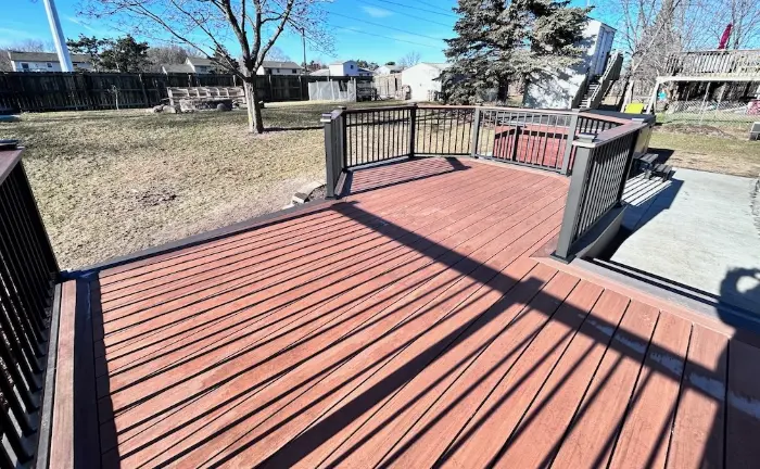 Deck repair near Maple Grove replacing damaged boards and railings